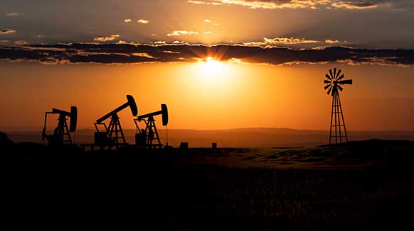 pumpjacks and windmill