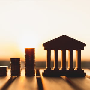 Bank and Coin Money Pile